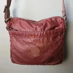 KIPLING Pink crossbody small bag Perfect size to travel, 4 pockets